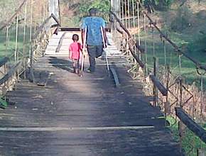 Jorge walking his son to school