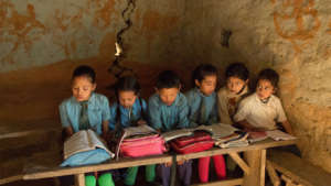 Students at a school being rebuilt by dZi