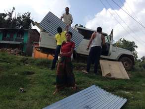 Materials going to Village