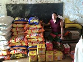 Bindu P., member of ADWAN's Board with supplies