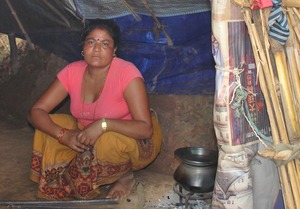 Balmaya in her straw mat home