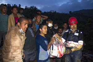 Handing food items to the residents