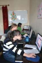 mentees at a computer class