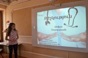 A mentees giving a presentation