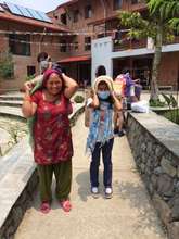 Carrying bags of food to the village