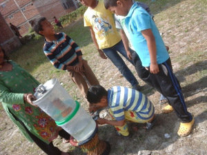 Children using the ECCA water filter