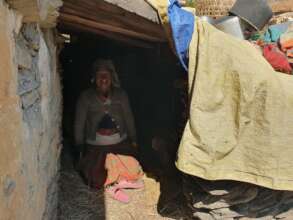 A woman staying outside due to fear of earthquake