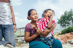 Bimal's granddaughter smiles for the camera.