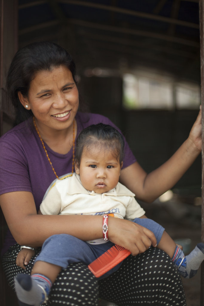 Mother and child living in temporary housing.