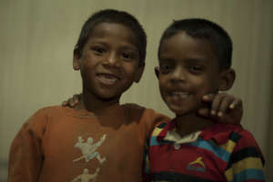 Children of weavers play after school.