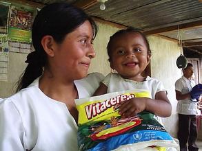 A mother and child enjoy Vitacereal(TM) in Guatemala