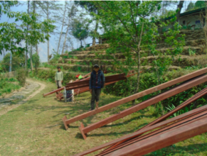 Building materials carried on foot to Tipling