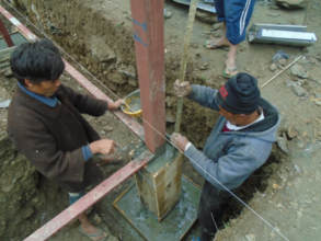 Installing metal posts for for Tipling health post