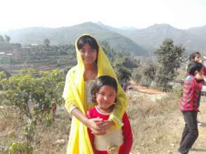 Two of our girls on a walk in Dhading