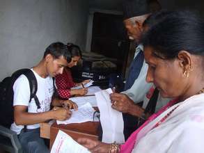 Helping citizens fill out forms to receive aid