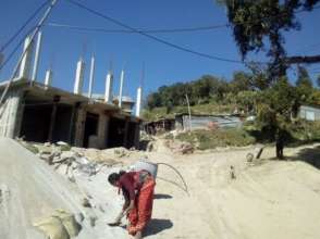 Women rebuilding their homes in the Kavre district