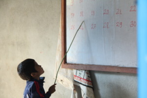 Child learning at Global Reach School