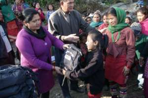ETC staff members distributing school supplies