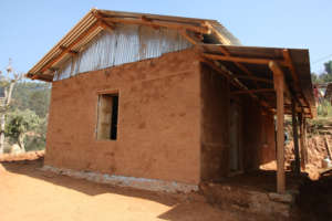 A BRAC demonstration house built by local masons.