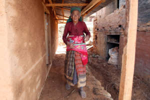 Bescu, 84, a recipient of a new BRAC home.