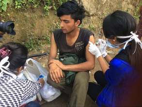 Providing tetanus toxoid to an injured victim