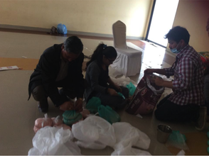 Volunteers gathering relief materials