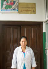 Rachana standing in doorway of Melamchi PHCC