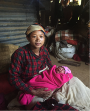 Anu and her baby at home