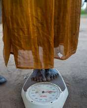 Children get weighed before seeing a clinician
