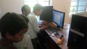 Girls students typing in Computer