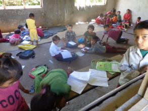 Kids studying   in the yard under the sun