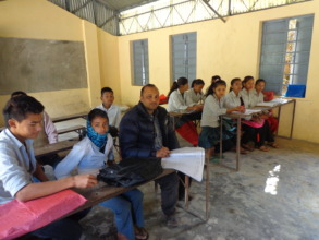 Lower secondary level students  taking exam