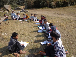 Students reading in School field