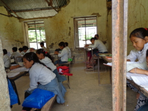 students  reading  in broken classroom