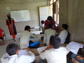Teacher teaching the students