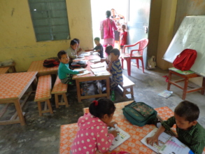 Lower class student doing their classworks
