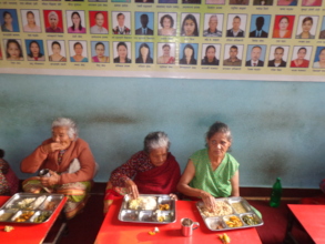 elderly people enjoying their food