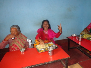 Laughing and enjoying their meal