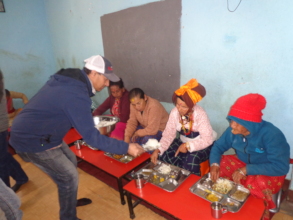 Chairman serving a food