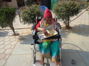 Blind Elderly eating food