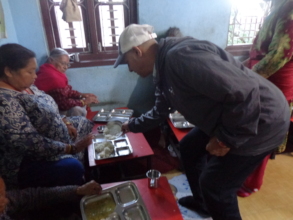 Chairman Distributing a food