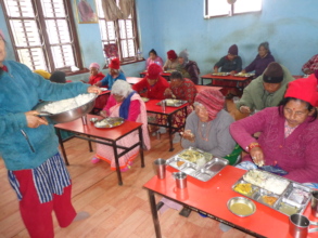 Elderly having their meals