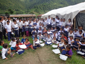 Students are happy to receive  the school dress