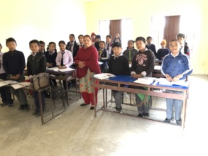 Students saying "good morning " to us.