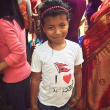 Young girl standing strong for Nepal