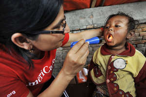 AmeriCares providing a check up for a child
