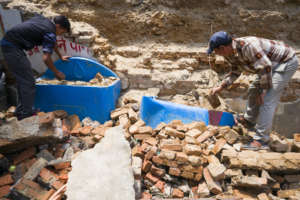 Splash Nepal staff dig systems out from rubble