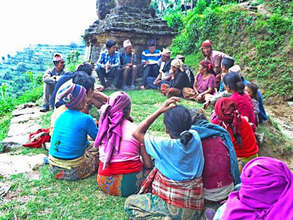 Community members discuss reconstruction efforts