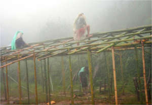 Villagers build a temporary learning center