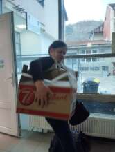 Ana at TIP Center taking her monthly food package